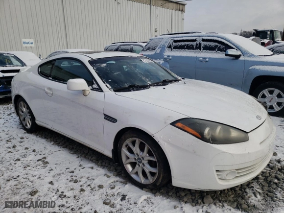 2008 Hyundai Tiburon GT with VIN KMHHN66F68U269896, listed as a Copart auction lot 87502765 with 196,437 mi miles and Salvage Title. Bid and sale history available at carsss.com. Image 4.