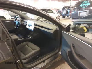 2024 Tesla Model 3 with VIN 5YJ3E1EA9RF835440, listed as a IAAI auction lot 41255559 with 4,789 mi miles. Bid and sale history available at carsss.com. Image 5.