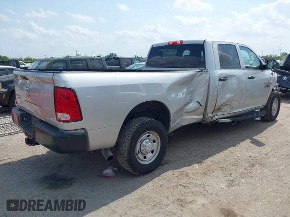 2018 Ram 2500 Tradesman with VIN 3C6UR4HL3JG325551, listed as a IAAI auction lot 42171102 with 306,153 mi miles and . Bid and sale history available at DreamBid. Image 4.