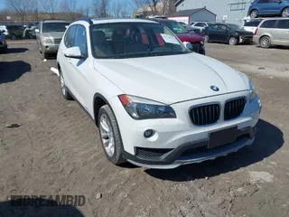 2015 BMW X1 xDrive28i with VIN WBAVL1C57FVY32440, listed as a IAAI auction lot 41739575 with 108,556 mi miles. Bid and sale history available at carsss.com. Image 1.