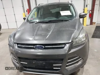 2016 Ford Escape Titanium with VIN 1FMCU9J93GUC39933, listed as a IAAI auction lot 42616323 with 116,482 mi miles and . Bid and sale history available at DreamBid. Image 12.