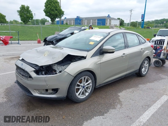 2016 Ford Focus SE z VIN 1FADP3F26GL332224, wystawiony jako IAAI lot #42167222 z przebiegiem 134 423 mil mil oraz . Historia ofert i sprzedaży dostępna na DreamBid. Obrazek 17.
