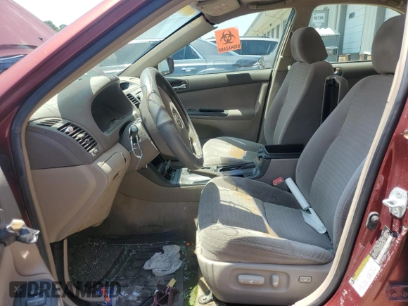 2005 Toyota Camry STD z VIN 4T1BE32K85U429361, wystawiony jako Copart lot #59214715 z przebiegiem 284 988 mil mil oraz Nie do naprawy • Non repairable. Historia ofert i sprzedaży dostępna na DreamBid. Obrazek 7.