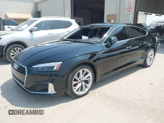 2023 Audi A5 Sportback Premium Plus z VIN WAUCBCF5XPA036226, wystawiony jako IAAI lot #42268816 z przebiegiem 13 141 mil mil oraz . Historia ofert i sprzedaży dostępna na DreamBid. Obrazek 2.