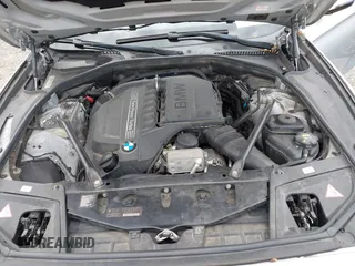 2015 BMW 5 Series 535i xDrive with VIN WBA5B3C54FD544802, listed as a IAAI auction lot 41283822 with 93,828 mi miles. Bid and sale history available at carsss.com. Image 10.