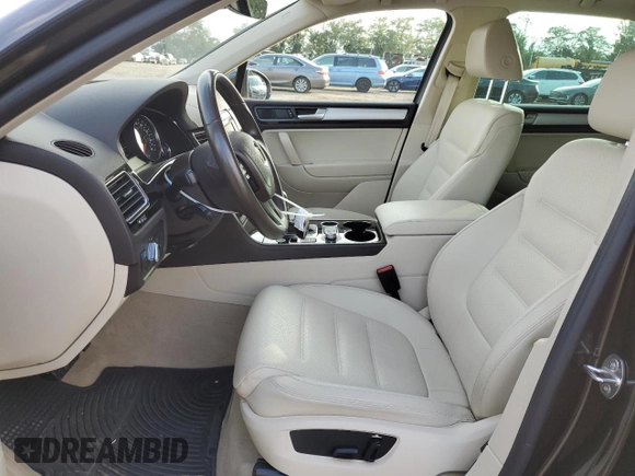 2017 Volkswagen Touareg Sport with VIN WVGEF7BP0HD005996, listed as a Copart auction lot 72883304 with 66,167 mi miles and Salvage Title. Bid and sale history available at DreamBid. Image 7.