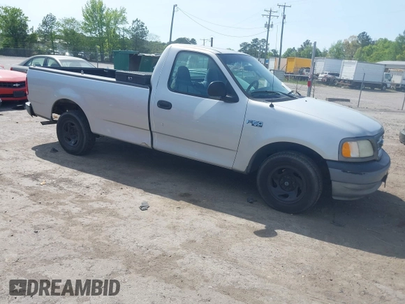 2002 Ford F-150 XL with VIN 1FTRF17202NB42616, listed as a IAAI auction lot 42117616 with 230,852 mi miles. Bid and sale history available at carsss.com. Image 1.