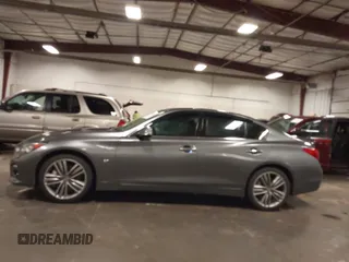 2014 Infiniti Q50 Premium with VIN JN1BV7ARXEM699902, listed as a IAAI auction lot 42135410 with 103,929 mi miles and . Bid and sale history available at DreamBid. Image 15.