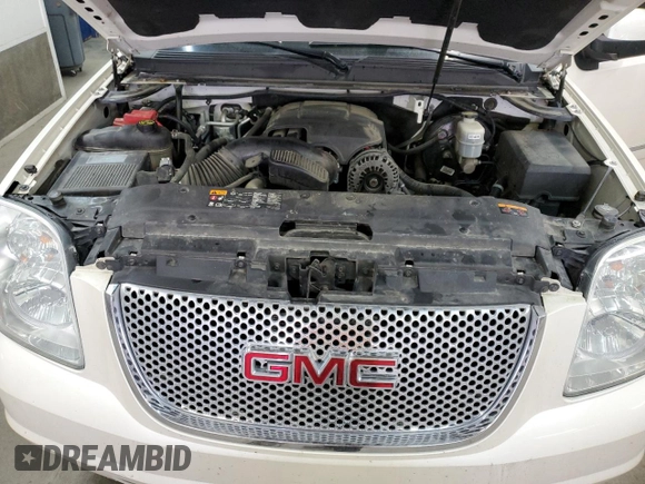 2014 GMC Yukon Denali with VIN 1GKS2EEF6ER141112, listed as a Copart auction lot 88526685 with 142,248 mi miles and Salvage Title. Bid and sale history available at carsss.com. Image 12.