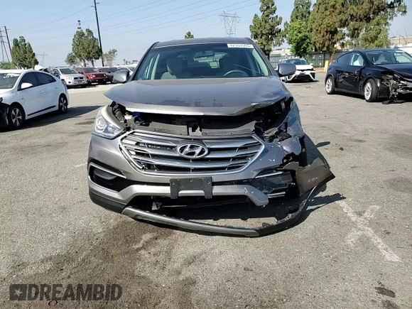 2017 Hyundai Santa Fe 2.4L with VIN 5XYZT3LB0HG392609, listed as a Copart auction lot 62553505 with 69,774 mi miles and Salvage title. Bid and sale history available at DreamBid. Image 14.