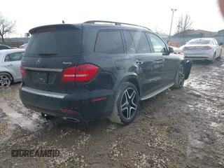 2017 Mercedes-Benz GLS 550 z VIN 4JGDF7DE8HA788641, wystawiony jako IAAI lot #41664587 z przebiegiem 156 707 mil mil oraz . Historia ofert i sprzedaży dostępna na DreamBid. Obrazek 4.