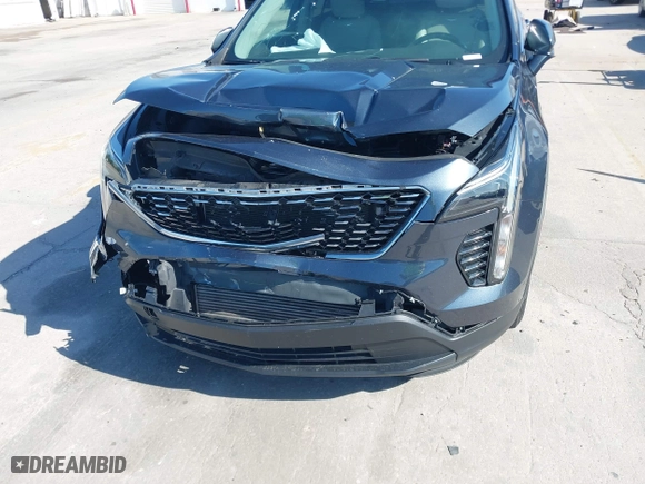 2019 Cadillac XT4 FWD Luxury with VIN 1GYAZAR45KF185338, listed as a IAAI auction lot 41990341 with 69,272 mi miles. Bid and sale history available at carsss.com. Image 6.