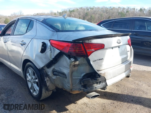 2013 Kia Optima EX with VIN 5XXGN4A77DG173344, listed as a IAAI auction lot 41830904 with 174,655 mi miles. Bid and sale history available at carsss.com. Image 6.