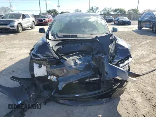 2024 Tesla Model 3 with VIN 5YJ3E1EA2RF752321, listed as a Copart auction lot 44593485 with 3,550 mi miles and Salvage Title. Bid and sale history available at carsss.com. Image 5.