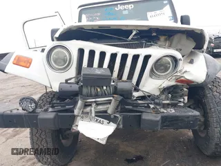 2005 Jeep Wrangler Sport with VIN 1J4FA49S25P320240, listed as a IAAI auction lot 41433371 with 144,552 mi miles. Bid and sale history available at carsss.com. Image 17.