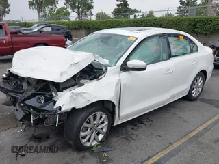 2013 Volkswagen Jetta SE with VIN 3VWDP7AJXDM432740, listed as a IAAI auction lot 42569834 with 118,659 mi miles and . Bid and sale history available at DreamBid. Image 2.