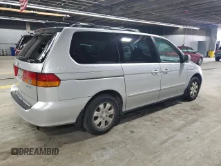 2002 Honda Odyssey EX with VIN 2HKRL18642H578718, listed as a Copart auction lot 59052525 with 170,928 mi miles and Salvage title. Bid and sale history available at DreamBid. Image 3.