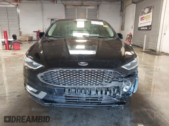 2017 Ford Fusion Titanium with VIN 3FA6P0SUXHR208653, listed as a IAAI auction lot 41312067 with 62,601 mi miles and . Bid and sale history available at DreamBid. Image 12.