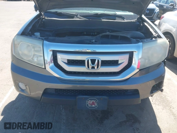 2010 Honda Pilot Touring with VIN 5FNYF4H94AB031167, listed as a IAAI auction lot 41800738 with 184,126 mi miles and . Bid and sale history available at carsss.com. Image 10.