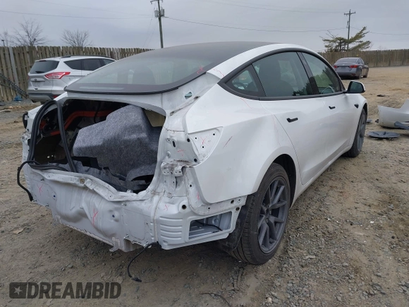 2021 Tesla Model 3 Long Range with VIN 5YJ3E1EB8MF019367, listed as a IAAI auction lot 41506094 with 14,257 mi miles and . Bid and sale history available at DreamBid. Image 4.