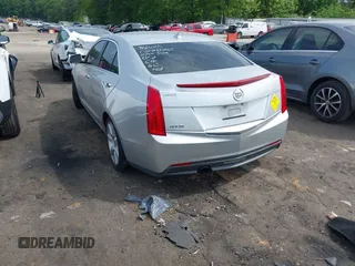 2014 Cadillac ATS Standard RWD with VIN 1G6AA5RA2E0103019, listed as a IAAI auction lot 42092185 with 114,373 mi miles and . Bid and sale history available at DreamBid. Image 3.