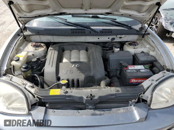 2002 Hyundai Santa Fe GLS with VIN KM8SC13D32U179968, listed as a Copart auction lot 60551434 with 77,676 mi miles and Clean Title. Bid and sale history available at carsss.com. Image 12.