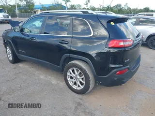 2014 Jeep Cherokee Altitude with VIN 1C4PJMCB5EW146365, listed as a IAAI auction lot 42021350 with 120,652 mi miles and . Bid and sale history available at carsss.com. Image 3.