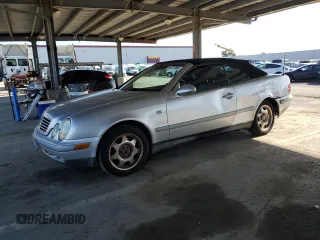1999 Mercedes-Benz CLK with VIN WDBLK65G5XT006724, listed as a Copart auction lot 48077565 with 151,463 mi miles and Salvage Title. Bid and sale history available at carsss.com. Image 1.