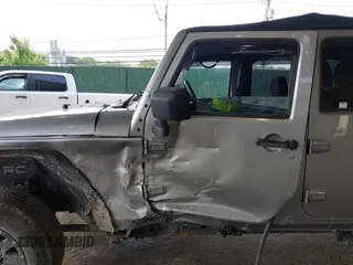 2017 Jeep Wrangler Unlimited Sport with VIN 1C4BJWDG1HL591515, listed as a IAAI auction lot 42426201 with 124,131 mi miles and . Bid and sale history available at DreamBid. Image 6.