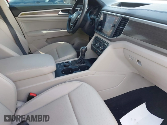 2019 Volkswagen Atlas SE z VIN 1V2UR2CAXKC539779, wystawiony jako IAAI lot #42188614 z przebiegiem 49 994 mil mil oraz . Historia ofert i sprzedaży dostępna na DreamBid. Obrazek 5.