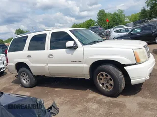 2003 Cadillac Escalade z VIN 1GYEK63N43R166347, wystawiony jako IAAI lot #42377612 z przebiegiem 255 892 mil mil oraz . Historia ofert i sprzedaży dostępna na DreamBid. Obrazek 14.
