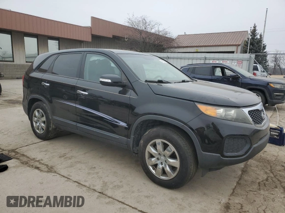 2012 Kia Sorento LX with VIN 5XYKT4A12CG211648, listed as a Copart auction lot 45023025 with 110,491 mi miles and Salvage Title. Bid and sale history available at DreamBid. Image 4.