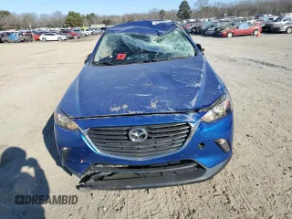2016 Mazda CX-3 Touring z VIN JM1DKBC75G0114585, wystawiony jako Copart lot #42182235 z przebiegiem 34 725 mil mil oraz Szkoda całkowita • Salvage title. Historia ofert i sprzedaży dostępna na DreamBid. Obrazek 5.