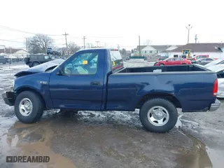 2003 Ford F-150 Heritage XL with VIN 2FTRF172X3CA60139, listed as a IAAI auction lot 41608378 with 81,965 mi miles. Bid and sale history available at carsss.com. Image 14.