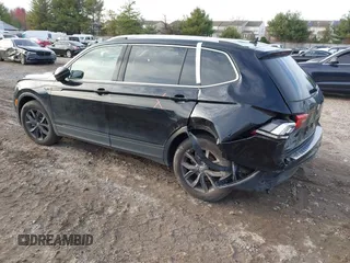 2022 Volkswagen Tiguan SE with VIN 3VV3B7AX8NM163352, listed as a IAAI auction lot 40946586 with 27,847 mi miles and . Bid and sale history available at DreamBid. Image 3.