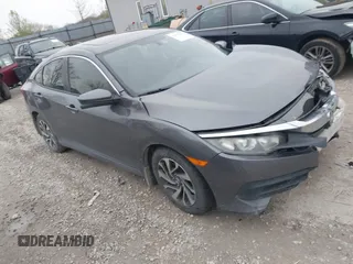 2018 Honda Civic EX with VIN 2HGFC2F79JH570403, listed as a IAAI auction lot 42018123 with 165,821 mi miles and . Bid and sale history available at DreamBid. Image 1.