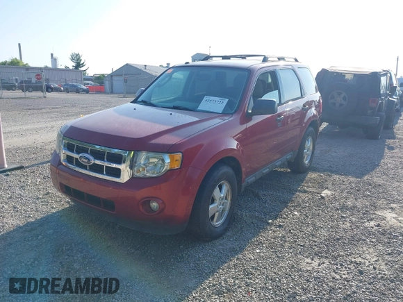 2012 Ford Escape XLT with VIN 1FMCU0DG9CKA56936, listed as a IAAI auction lot 42573722 with 138,232 mi miles and . Bid and sale history available at DreamBid. Image 2.