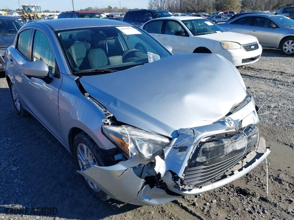 2017 Toyota Yaris iA with VIN 3MYDLBYV6HY183623, listed as a IAAI auction lot 41315274 with 65,635 mi miles. Bid and sale history available at carsss.com. Image 6.