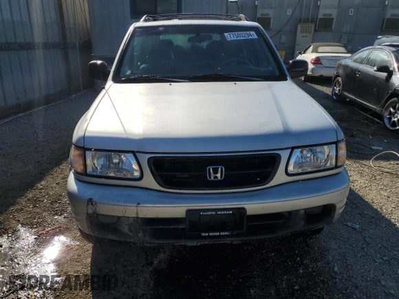 2001 Honda Passport LX z VIN 4S6CK58WX14410363, wystawiony jako Copart lot #77500294 z przebiegiem 195 272 mil mil oraz Czysty tytuł • Clean title. Historia ofert i sprzedaży dostępna na DreamBid. Obrazek 5.