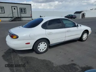 1997 Ford Taurus z VIN 1FALP5217VG249170, wystawiony jako Copart lot #51317795 z przebiegiem 87 730 mil mil oraz Czysty tytuł • Clean title. Historia ofert i sprzedaży dostępna na DreamBid. Obrazek 3.
