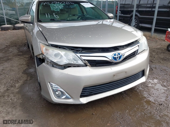 2014 Toyota Camry Hybrid LE with VIN 4T1BD1FK4EU106488, listed as a IAAI auction lot 40794286 with 98,911 mi miles. Bid and sale history available at carsss.com. Image 6.