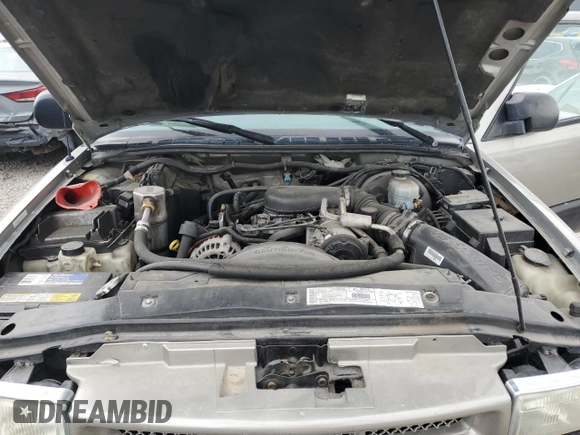 1999 Chevrolet Blazer Trailblazer z VIN 1GNDT13W9X2238417, wystawiony jako Copart lot #80087223 z przebiegiem Nie podano mil oraz Szkoda całkowita • Salvage title. Historia ofert i sprzedaży dostępna na DreamBid. Obrazek 11.