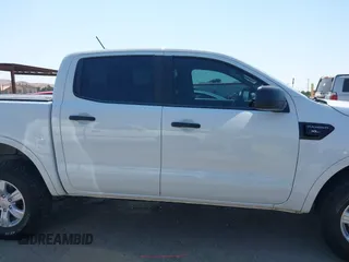 2021 Ford Ranger XL z VIN 1FTER4EH5MLE05003, wystawiony jako IAAI lot #42649042 z przebiegiem 62 571 mil mil oraz . Historia ofert i sprzedaży dostępna na DreamBid. Obrazek 13.