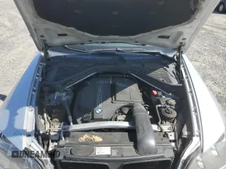 2012 BMW X5 35i with VIN 5UXZV4C5XCL751020, listed as a Copart auction lot 59327845 with 106,249 mi miles and Salvage title. Bid and sale history available at DreamBid. Image 12.