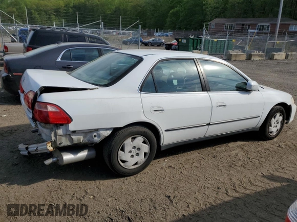 2000 Honda Accord LX z VIN 1HGCG1642YA080255, wystawiony jako Copart lot #53636855 z przebiegiem 146 478 mil mil oraz Szkoda całkowita • Salvage title. Historia ofert i sprzedaży dostępna na DreamBid. Obrazek 3.