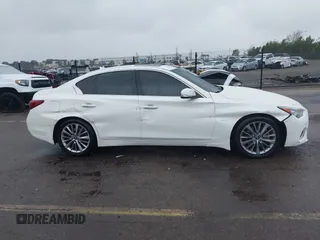 2019 Infiniti Q50 Signature Edition with VIN JN1EV7AP9KM514861, listed as a IAAI auction lot 41805236 with 58,286 mi miles and . Bid and sale history available at carsss.com. Image 13.