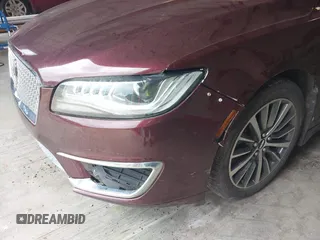 2018 Lincoln MKZ Premiere z VIN 3LN6L5A94JR623078, wystawiony jako IAAI lot #42043246 z przebiegiem 98 967 mil mil oraz . Historia ofert i sprzedaży dostępna na DreamBid. Obrazek 6.