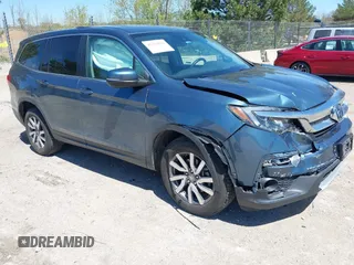 2020 Honda Pilot EX-L with VIN 5FNYF6H51LB063554, listed as a IAAI auction lot 42221831 with 130,220 mi miles and . Bid and sale history available at DreamBid. Image 1.