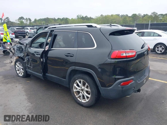 2015 Jeep Cherokee Latitude with VIN 1C4PJLCB9FW737360, listed as a IAAI auction lot 41939681 with 226,603 mi miles and . Bid and sale history available at carsss.com. Image 3.