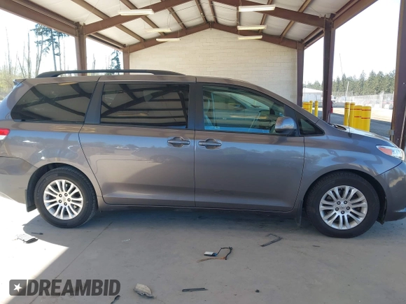 2011 Toyota Sienna XLE AAS with VIN 5TDYK3DC7BS047822, listed as a IAAI auction lot 42073635 with 150,424 mi miles. Bid and sale history available at carsss.com. Image 14.